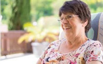 Older woman showing Attitude of Gratitude by smiling